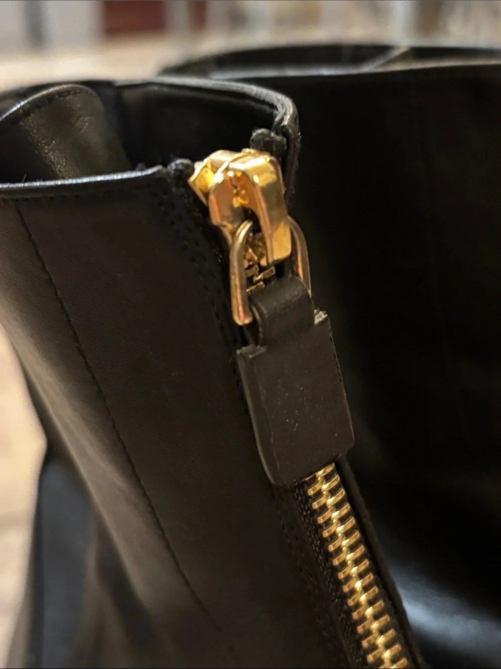 Stuart Weitzman Black Leather Front-Zip Ankle Boots with Gold Zipper
